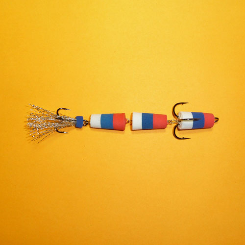 картинка Приманка джиг. ФЛАЖОК 130 крас./син./бел. от магазина Fisherman Market